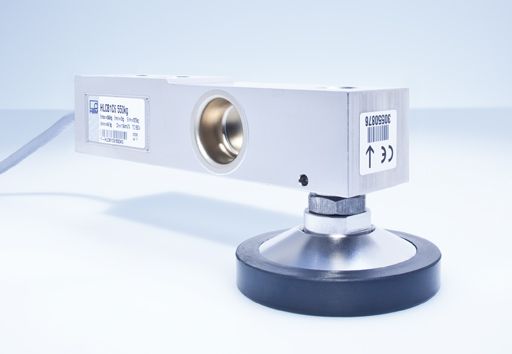Loading foot simplifies construction of high-precision scales